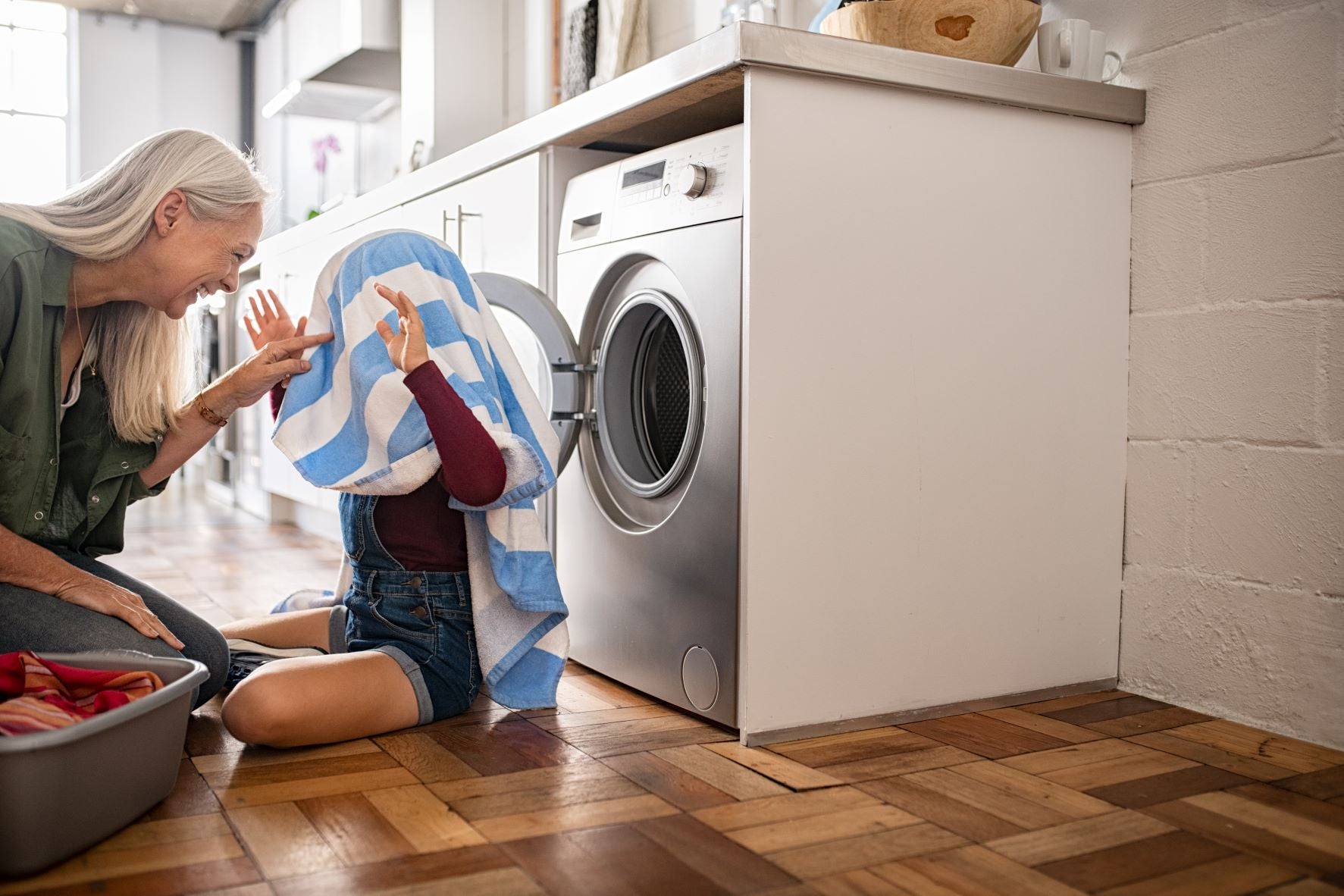 woman doing laundry - Nutroz Ozone Technology